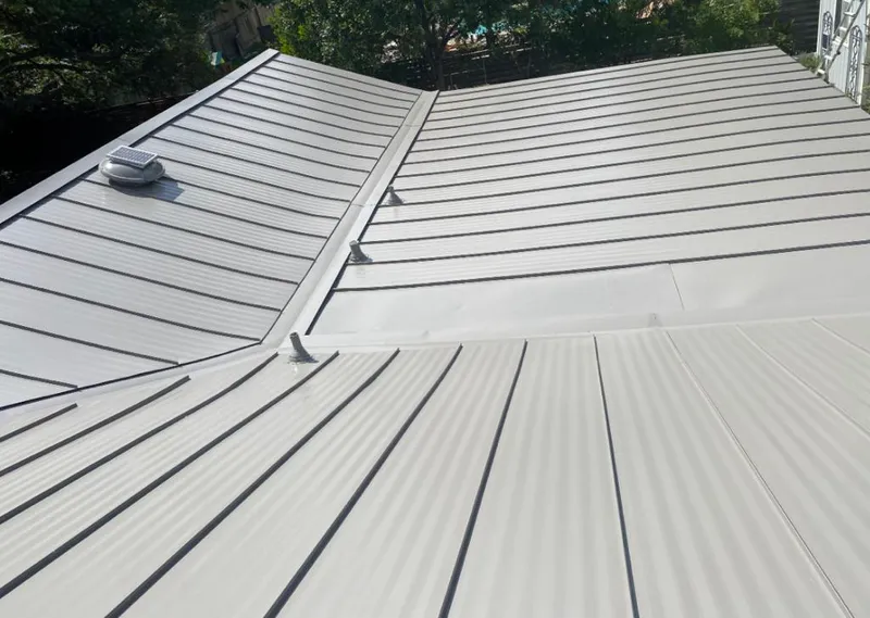 Solar attic fan installed on a metal roof for Roof Ventilation in Alum Rock